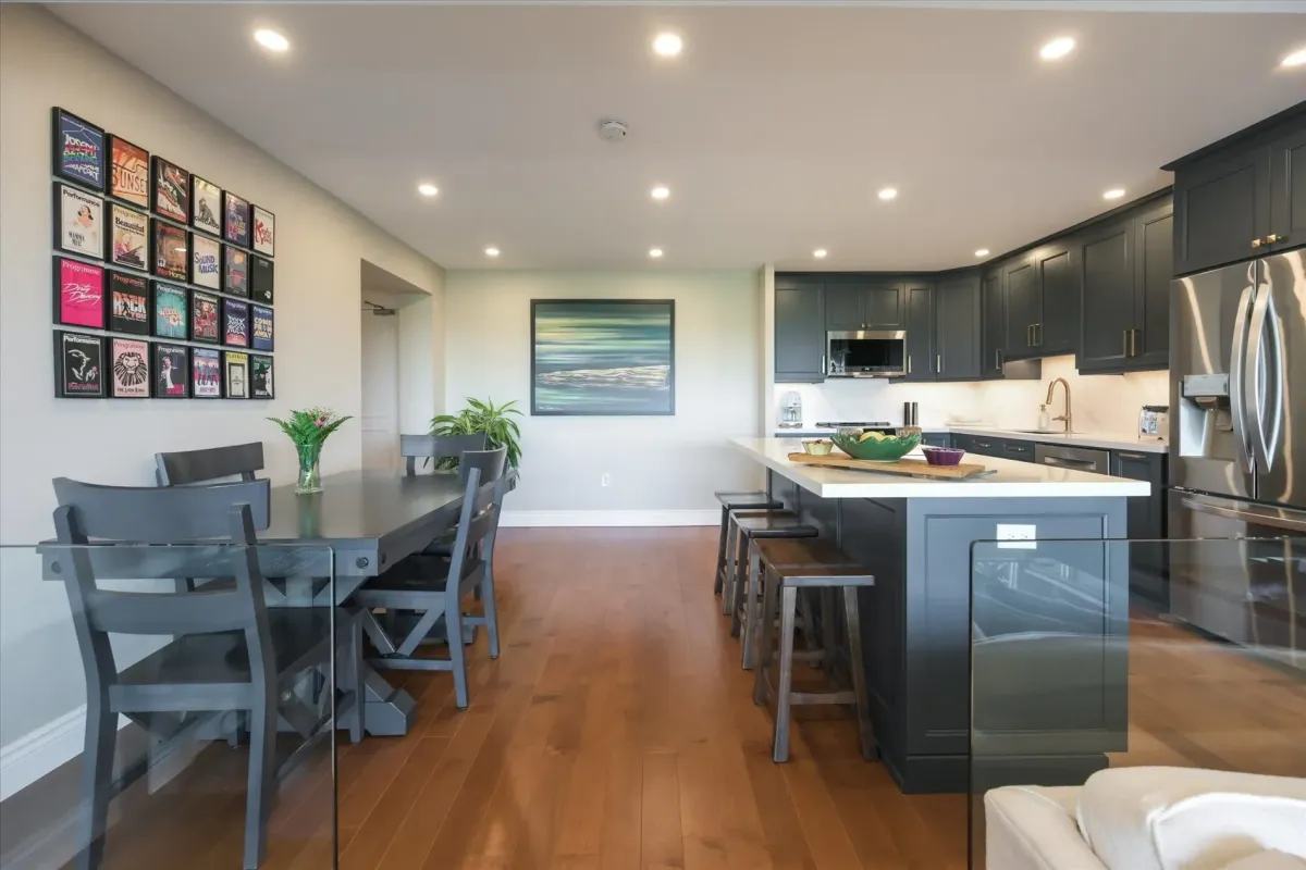 View from the dining area looking towards the kitchen island and main living space at 240 Scarlett Rd #912.