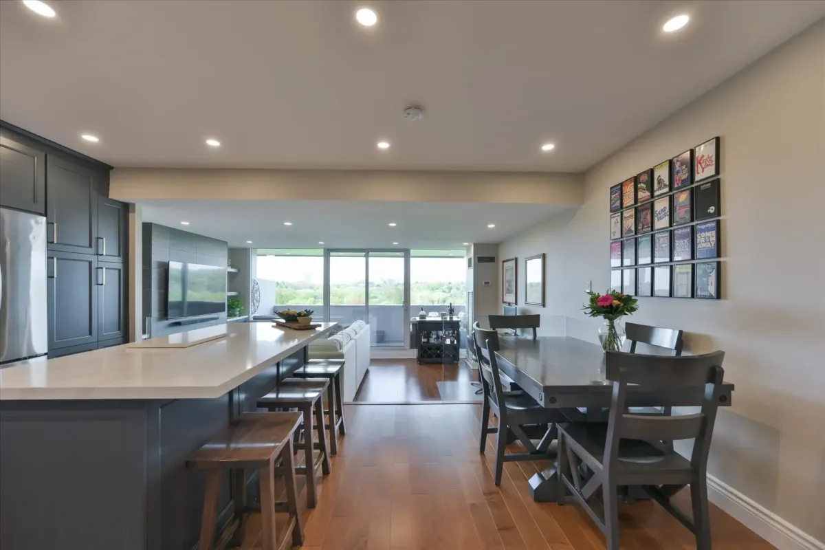 Spacious dining and living area layout within 240 Scarlett Rd #912 with large windows offering panoramic views.