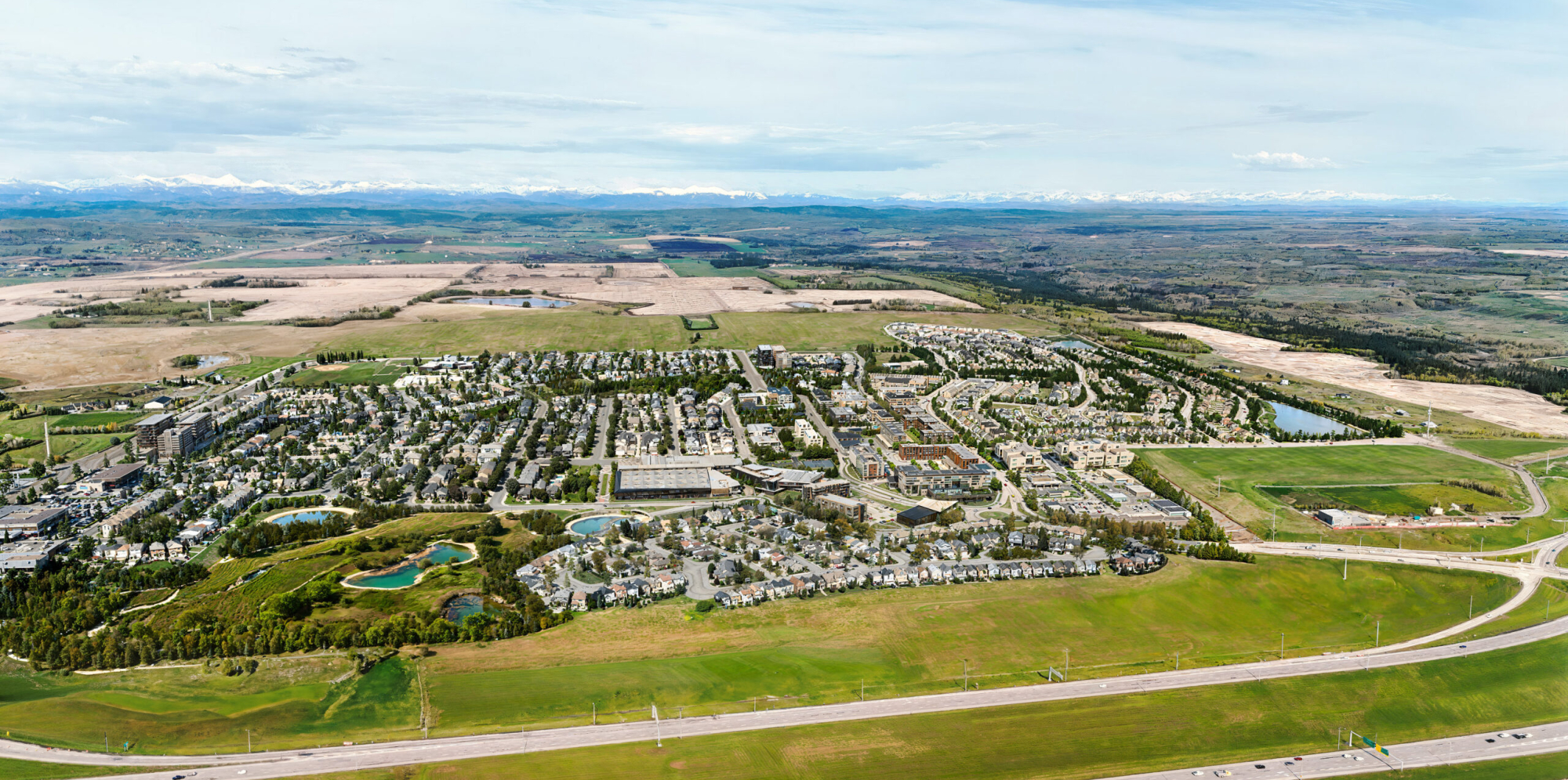 15020 Bow Trail SW Alpine Park Calgary aerial drone view of master planned residential community development
