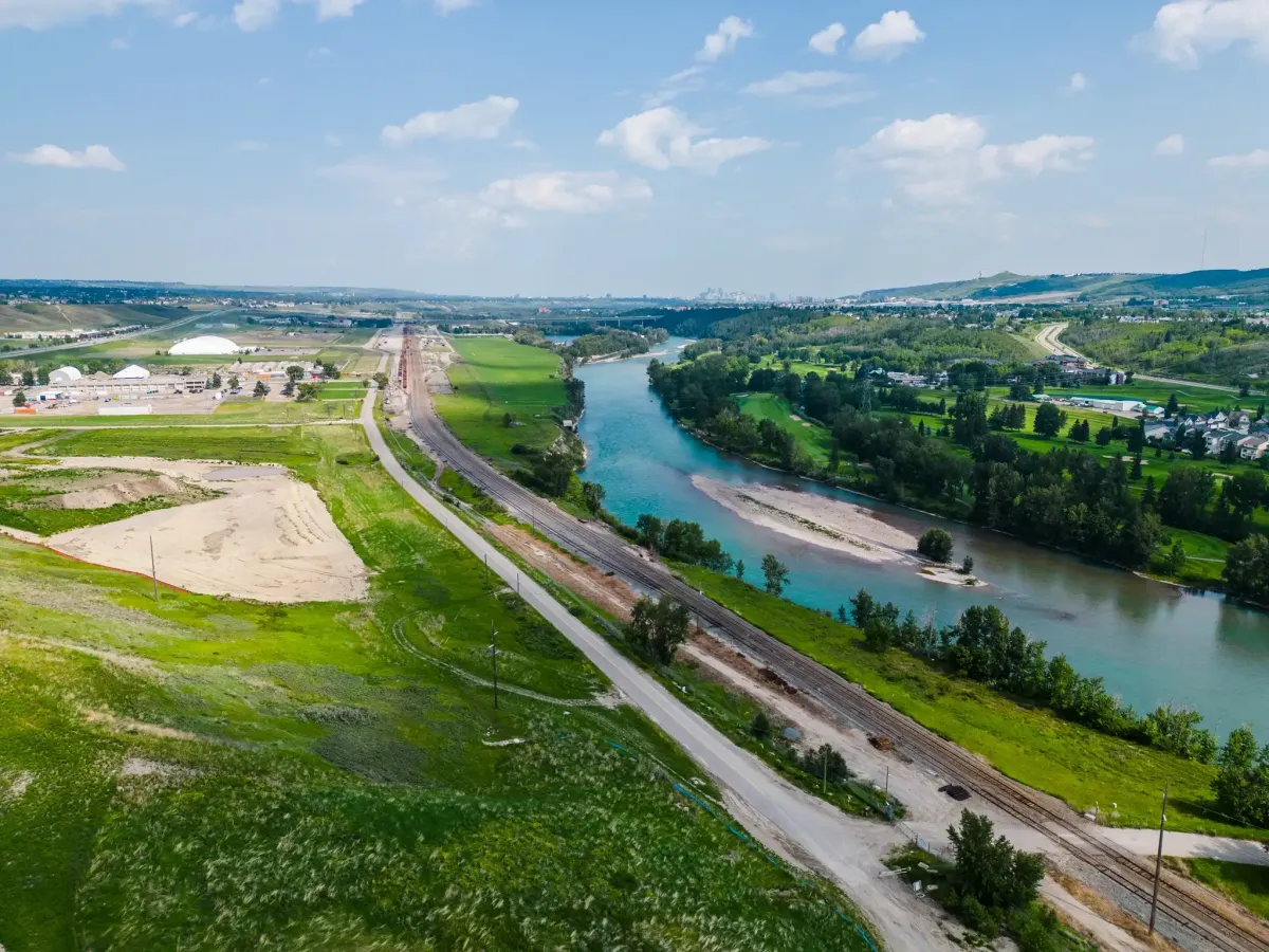 Rockland Park NW Calgary wide aerial panoramic perspective of the winding Bow River and green environmental reserve spaces.