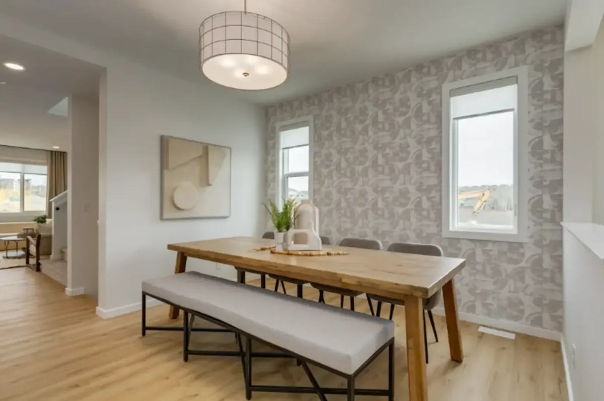 221 101 Street SW Osprey Hill pre construction freehold street townhomes with attached 2 car garages by Homes by Avi