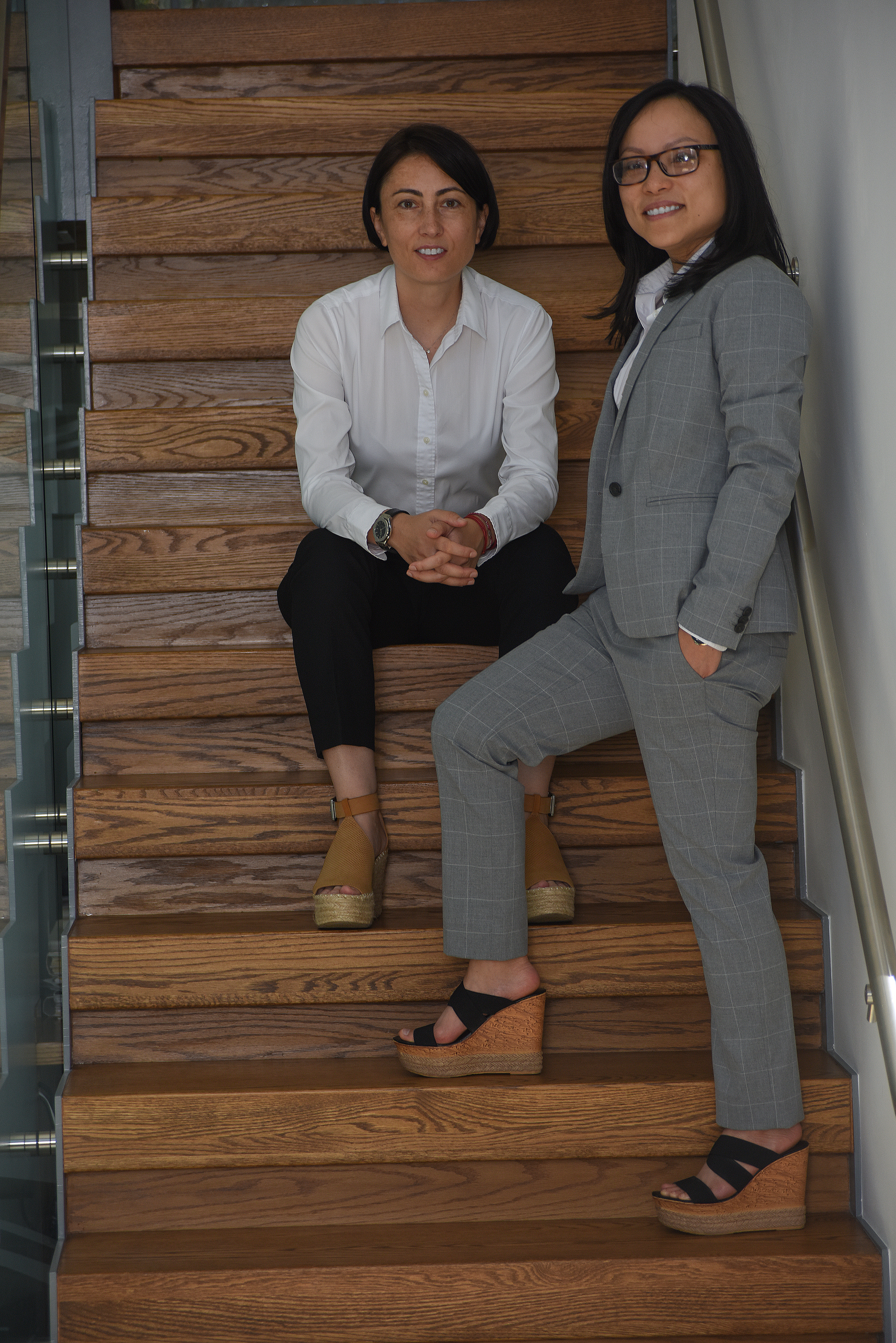 Quynh Tran and Dominika Sliwinska, professional real estate agents in the GTA, providing expert market knowledge and personalized service for buyers and sellers.