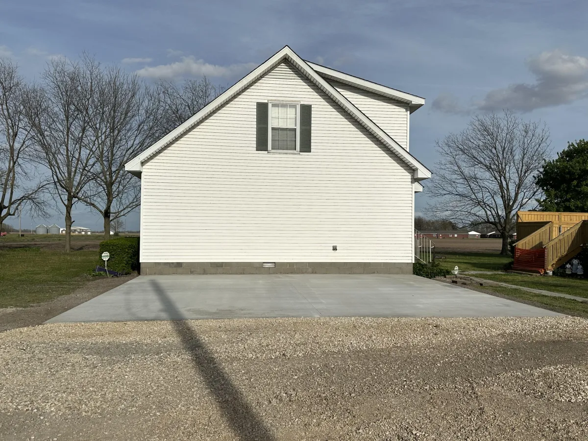 brown house beside trees during daytime