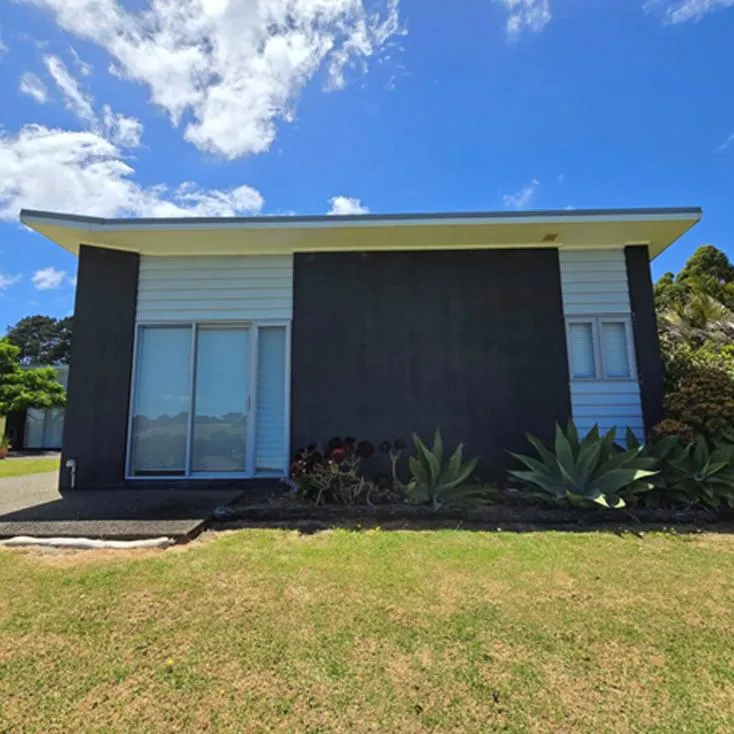 blue painted house exterior in Auckland	