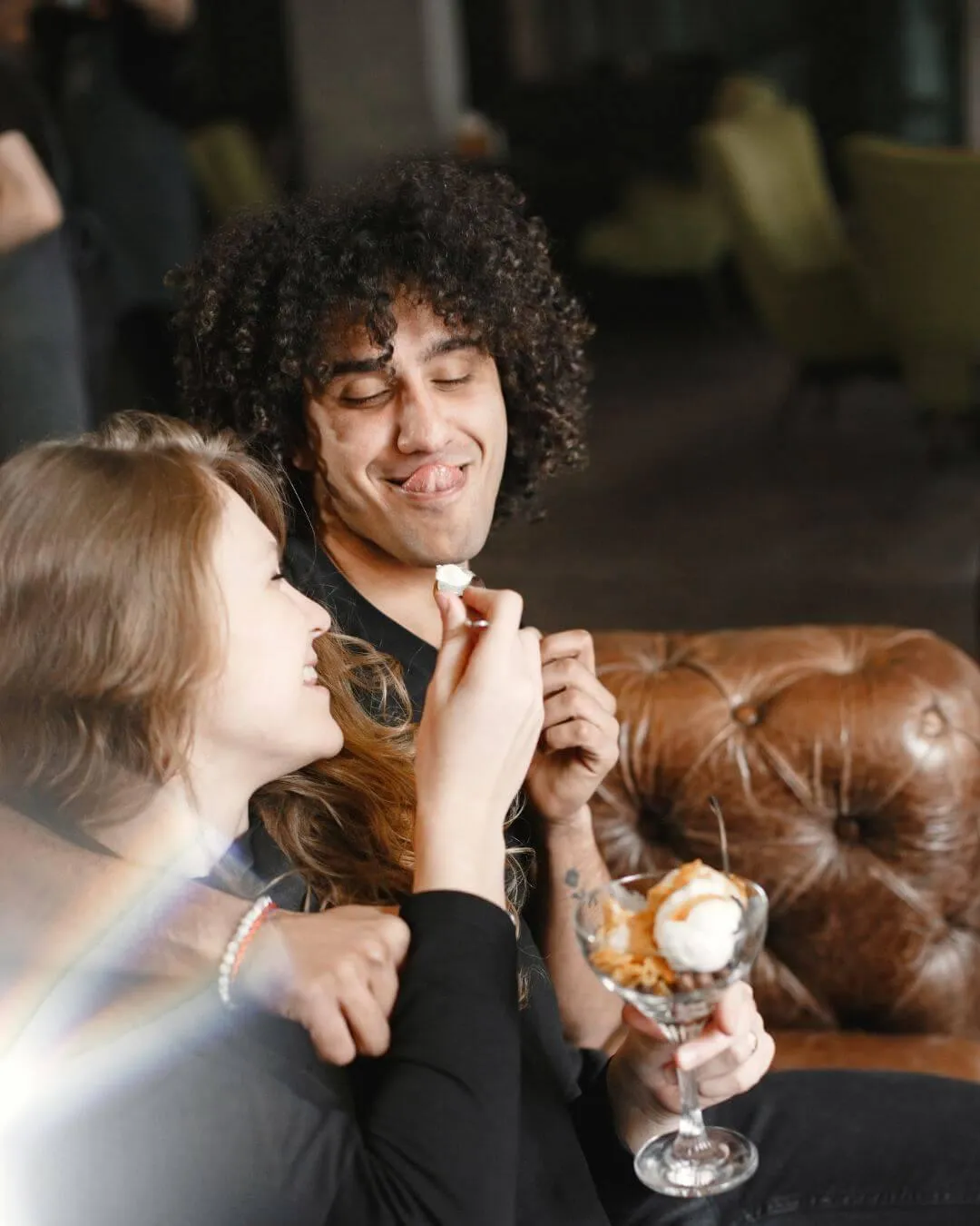 Young couple laughing during a date night — Ashley & Jake's success story with The Date Night Blueprint