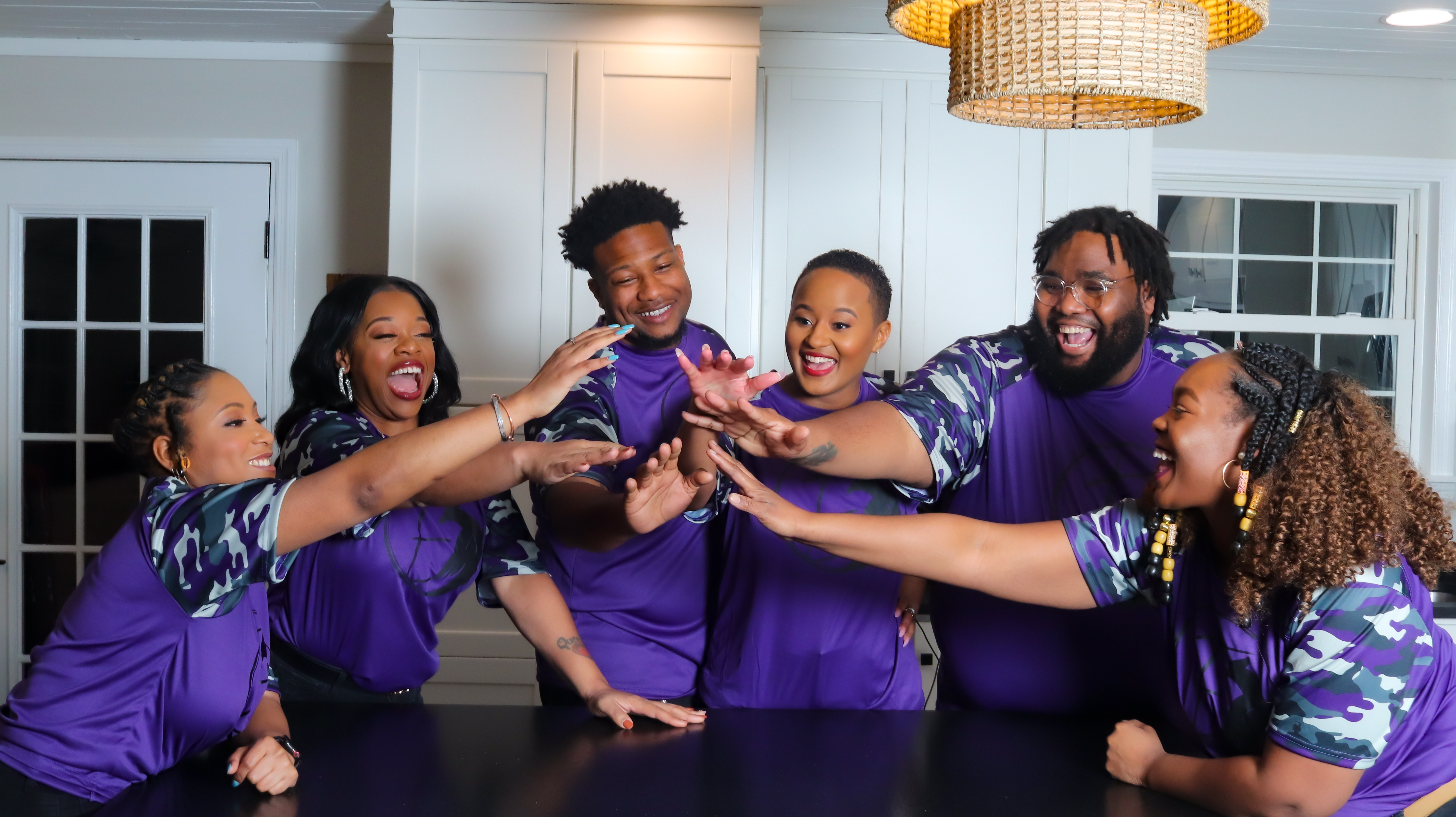 a man in a white shirt and tie holding a folder