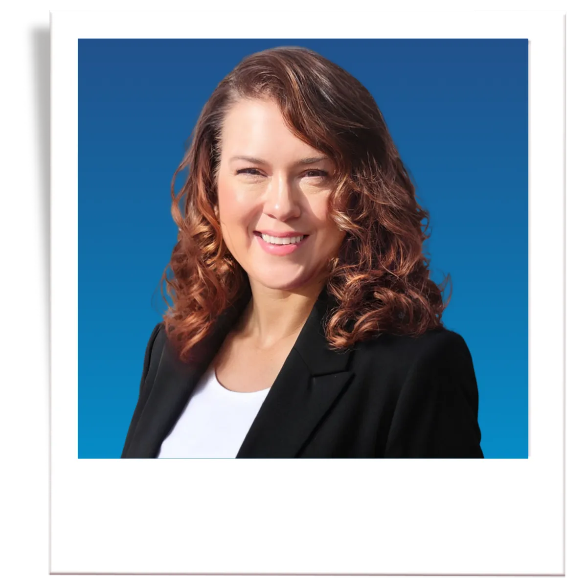 A picture of professional insurance agent, Noe Recendez. The picture is in the style of a polaroid. The insurance agent is wearing a dark grey men's blazer, a blue button down shirt, and a black tie. The agent is in front of a blue gradient background. 