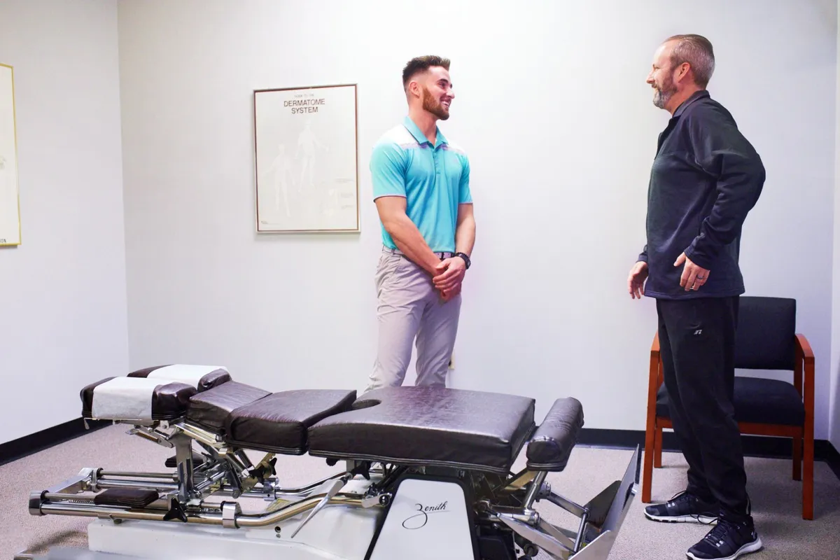 Dr. Holt with patient receiving shockwave therapy