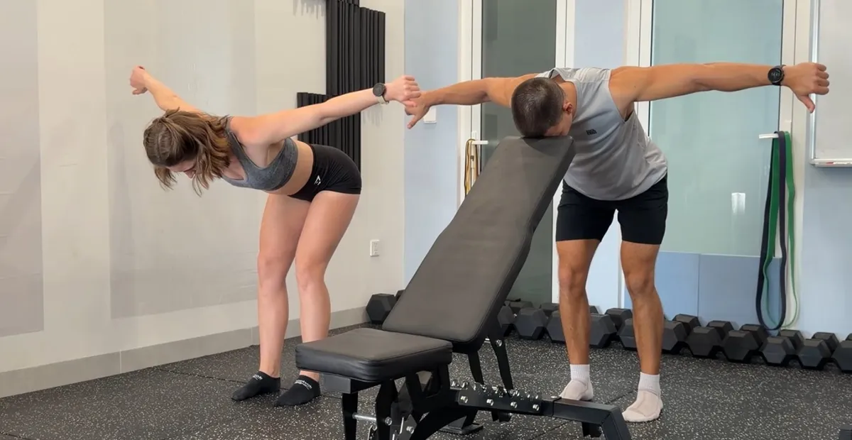 Svenja and Pascal demonstrate Bent-Over Y-T-W, with a supported variation alongside.