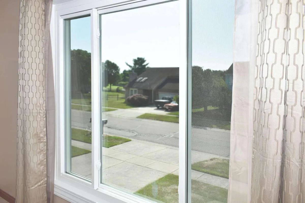 a sliding window with white frame