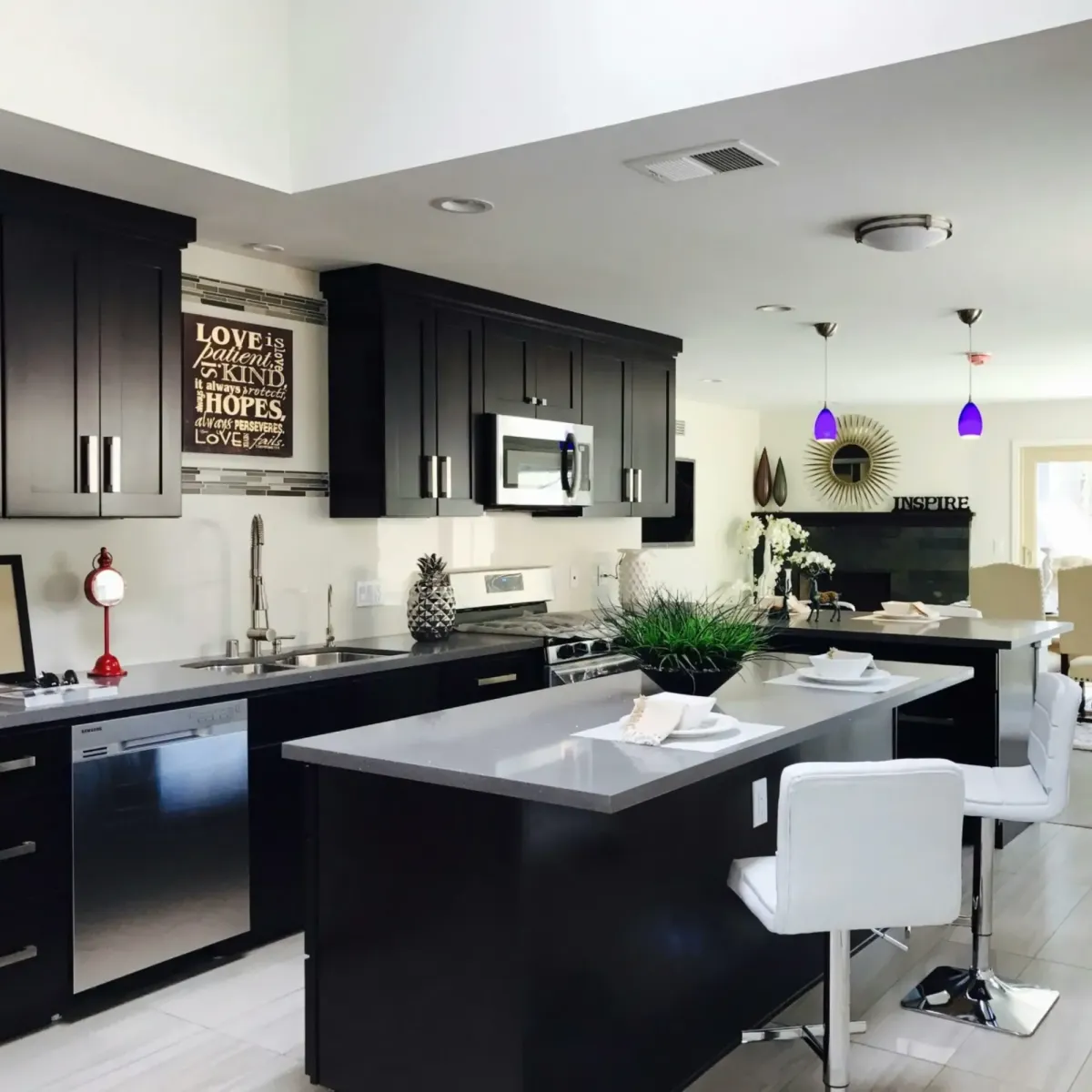 Open-concept kitchen renovation in a Toronto home with a large island and stainless steel appliances.