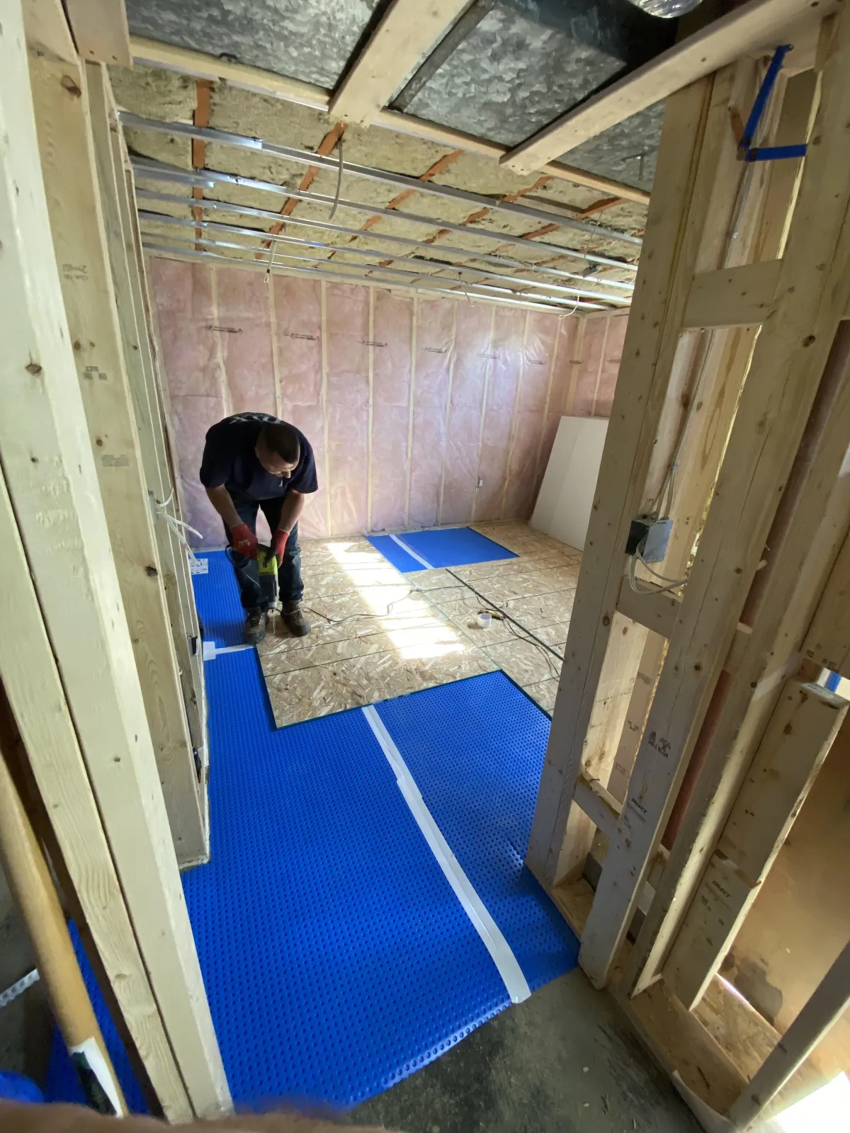 Second-story home addition in Toronto adding extra bedrooms to a suburban house.