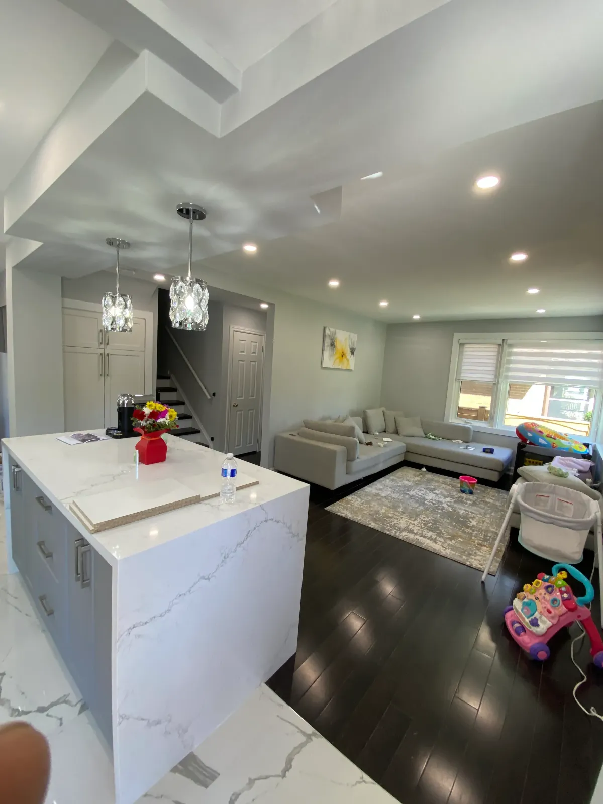 A Toronto kitchen remodeling project with an expanded cooking space and upgraded lighting.