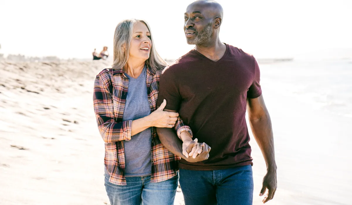 a group of birds sitting on top of a wire