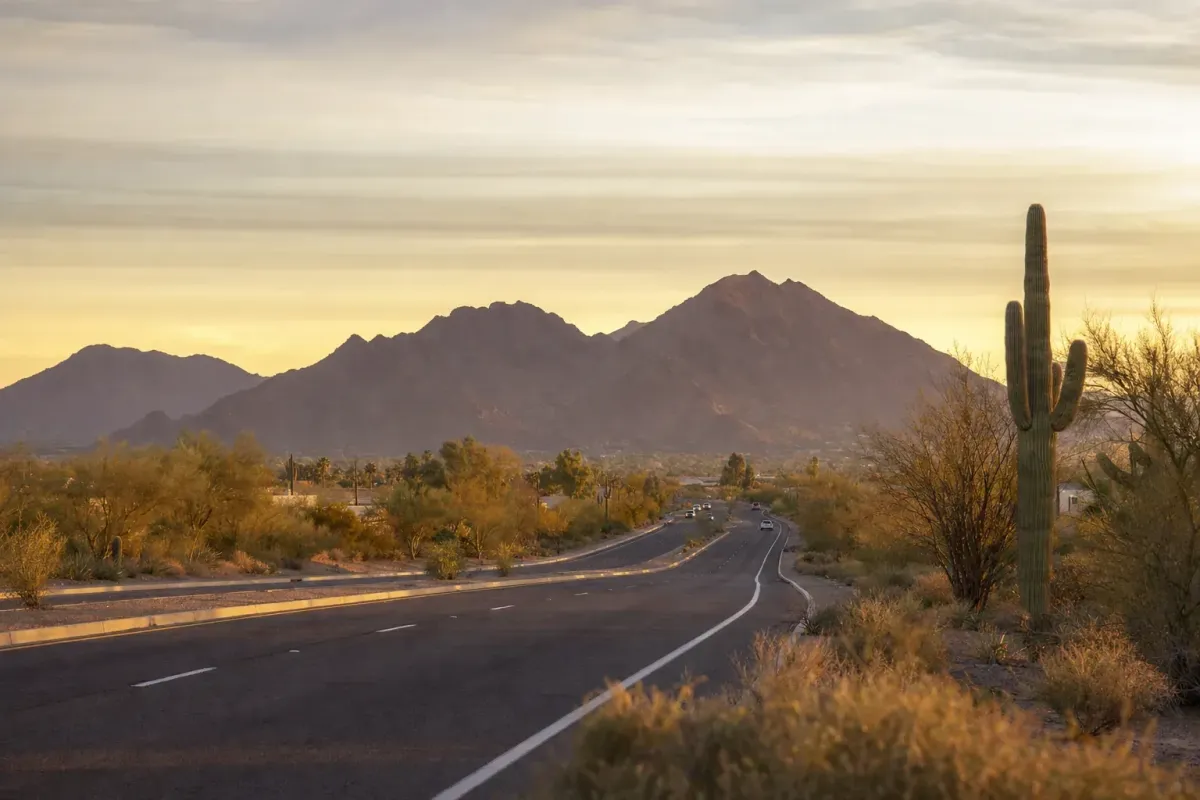 Arizona desert highway at golden hour representing car accident injury risk on Phoenix-area roads