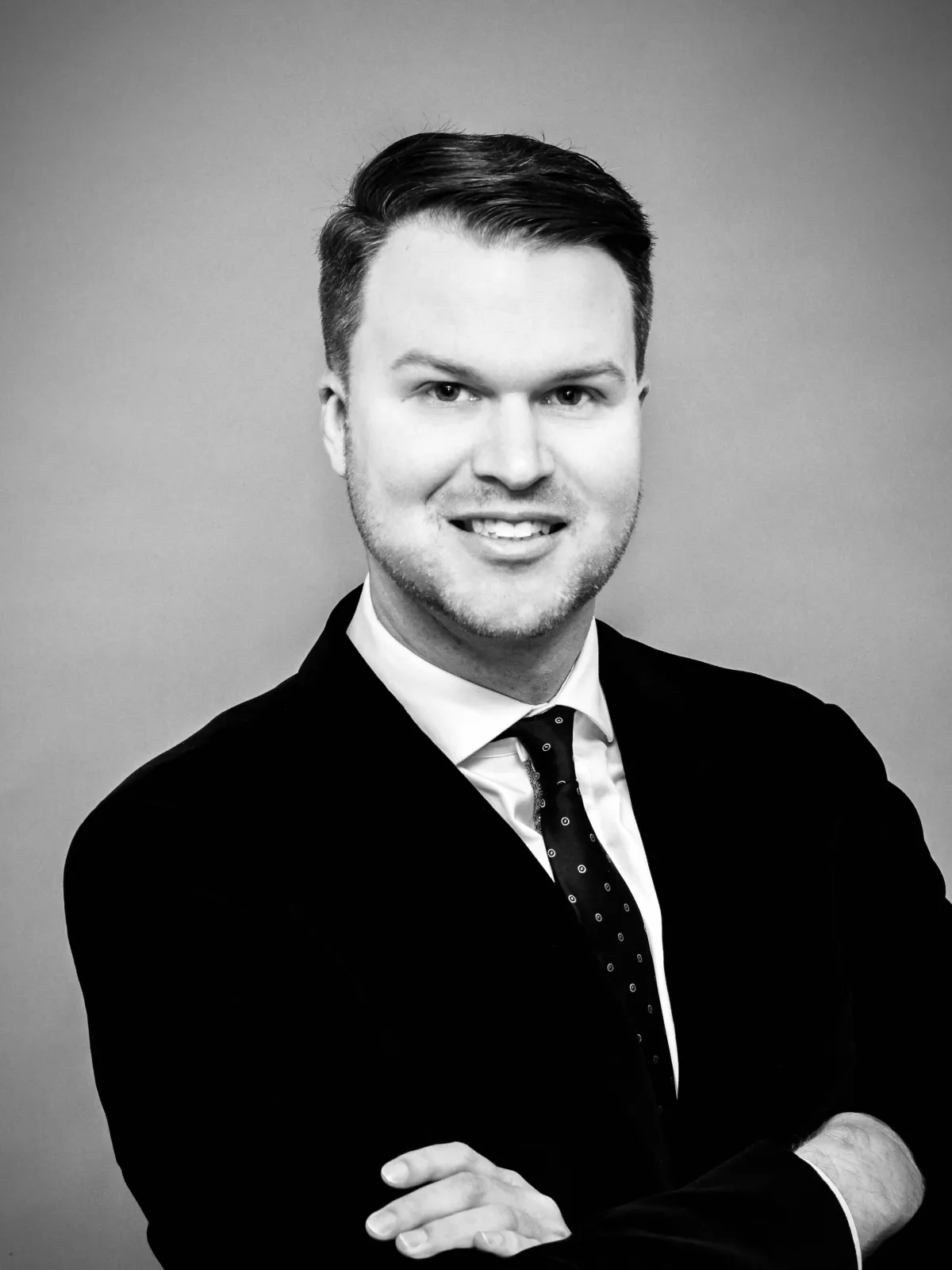 Portrait of Cassandra Holt, Managing Partner at Cedarline Services, in a modern workshop environment.