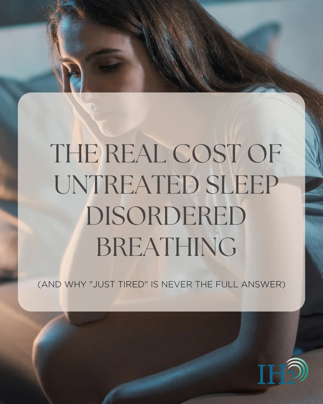 girl sitting on edge of bed tired from not sleeping well