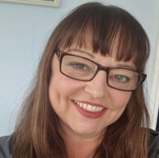 Friendly customer support agent ready to help with voucher purchases