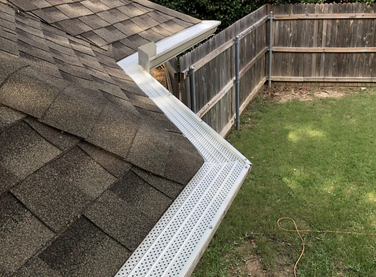 Gutter cleaning and maintenance service being performed in Lubbock