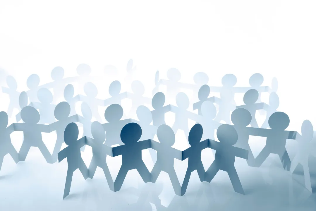 person writing on white paper