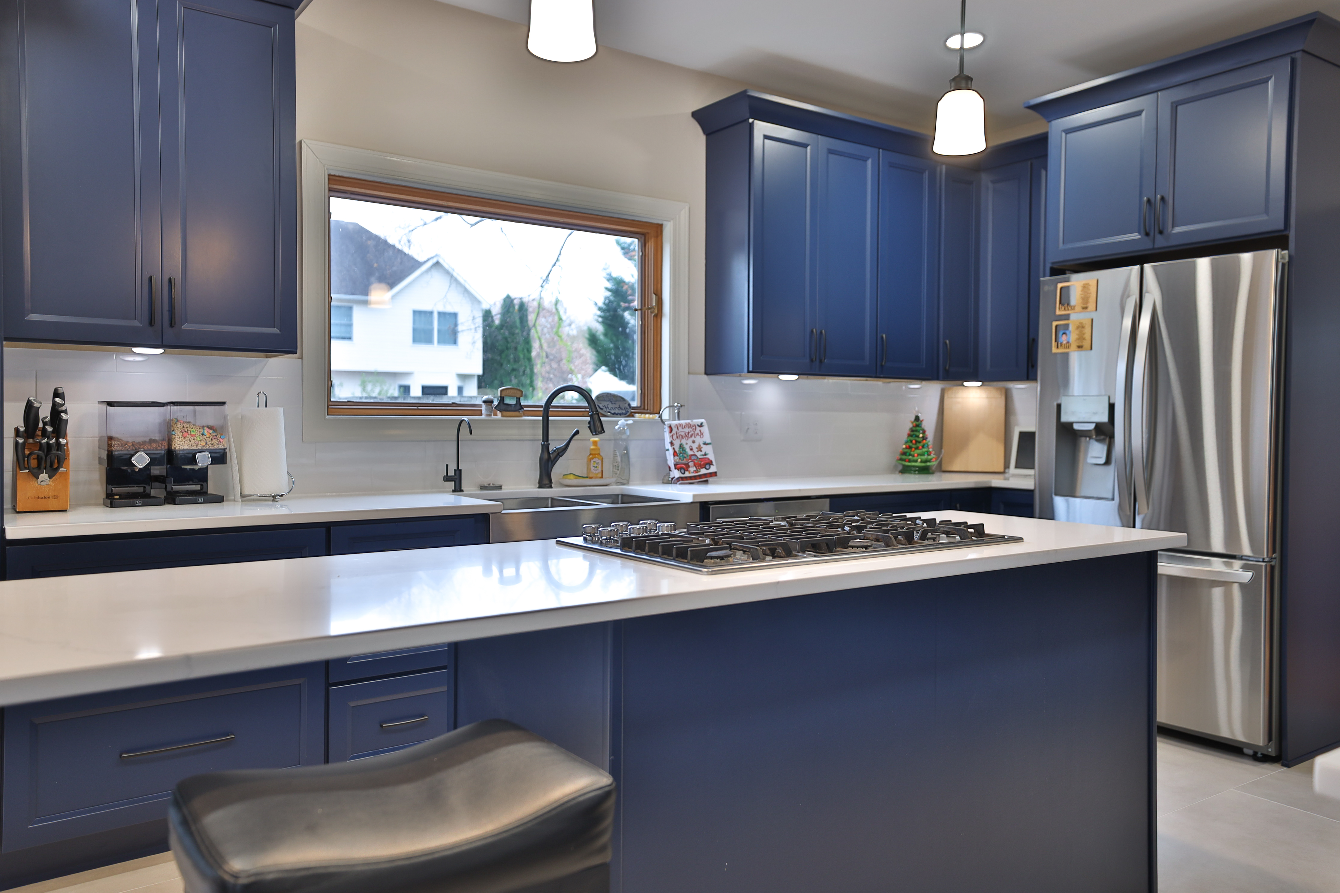 Minimalist kitchen featuring smart storage solutions in Chevy Chase home