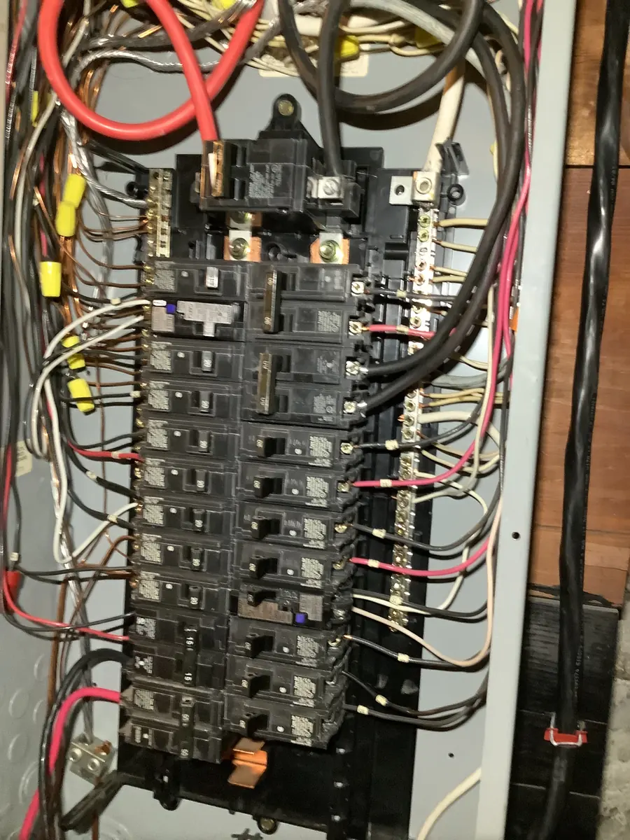 Electrical breaker panel and wiring photographed by Sylvester Electric