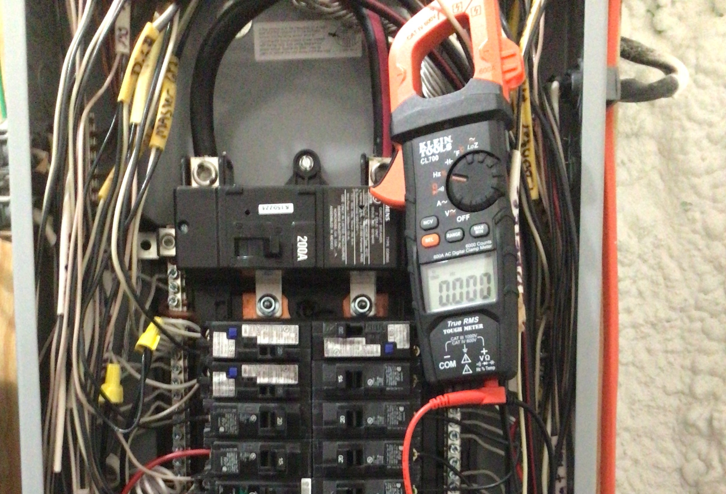 Electrical panel troubleshooting and diagnostics with meter by licensed electrician