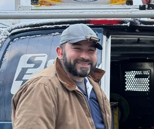 Sylvester electric electrician working on meter