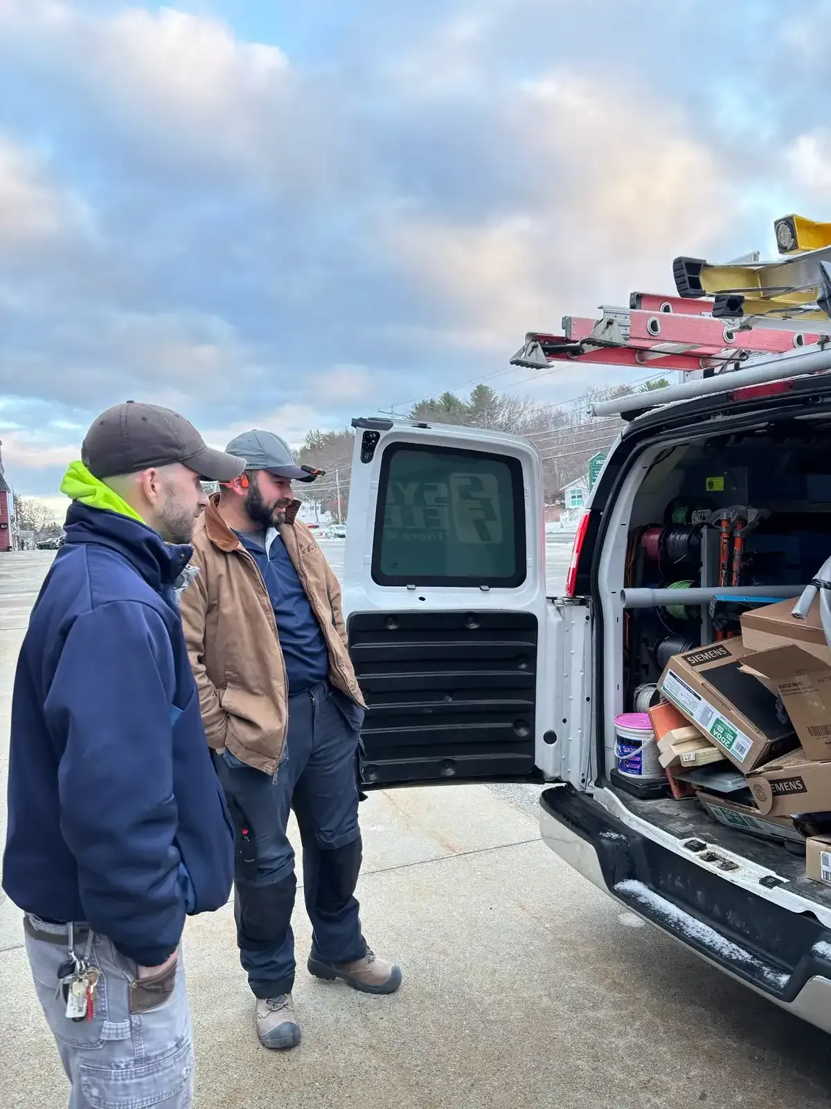 Sylvester electric electrician working on meter