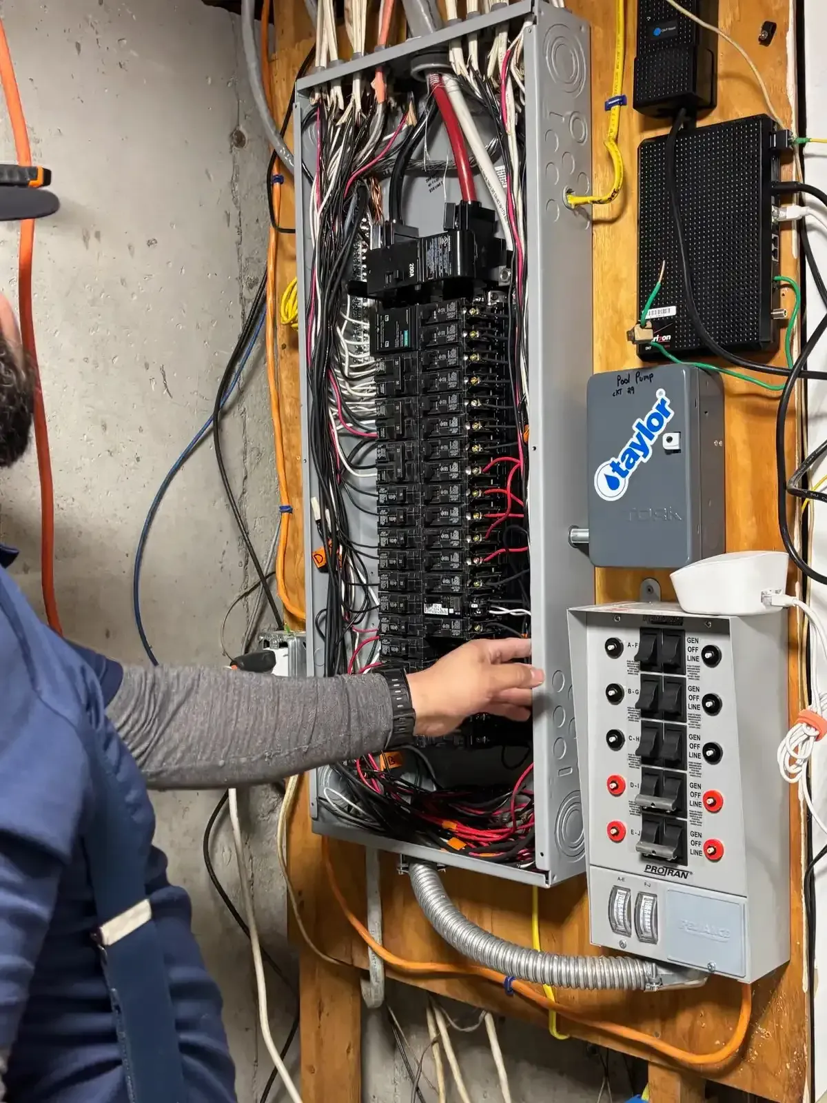Sylvester electric electrician working on meter