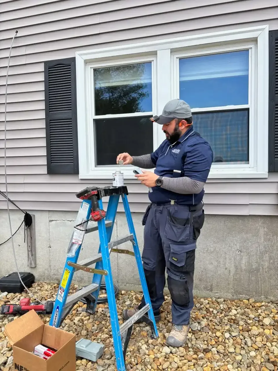 Sylvester electric electrician working on meter