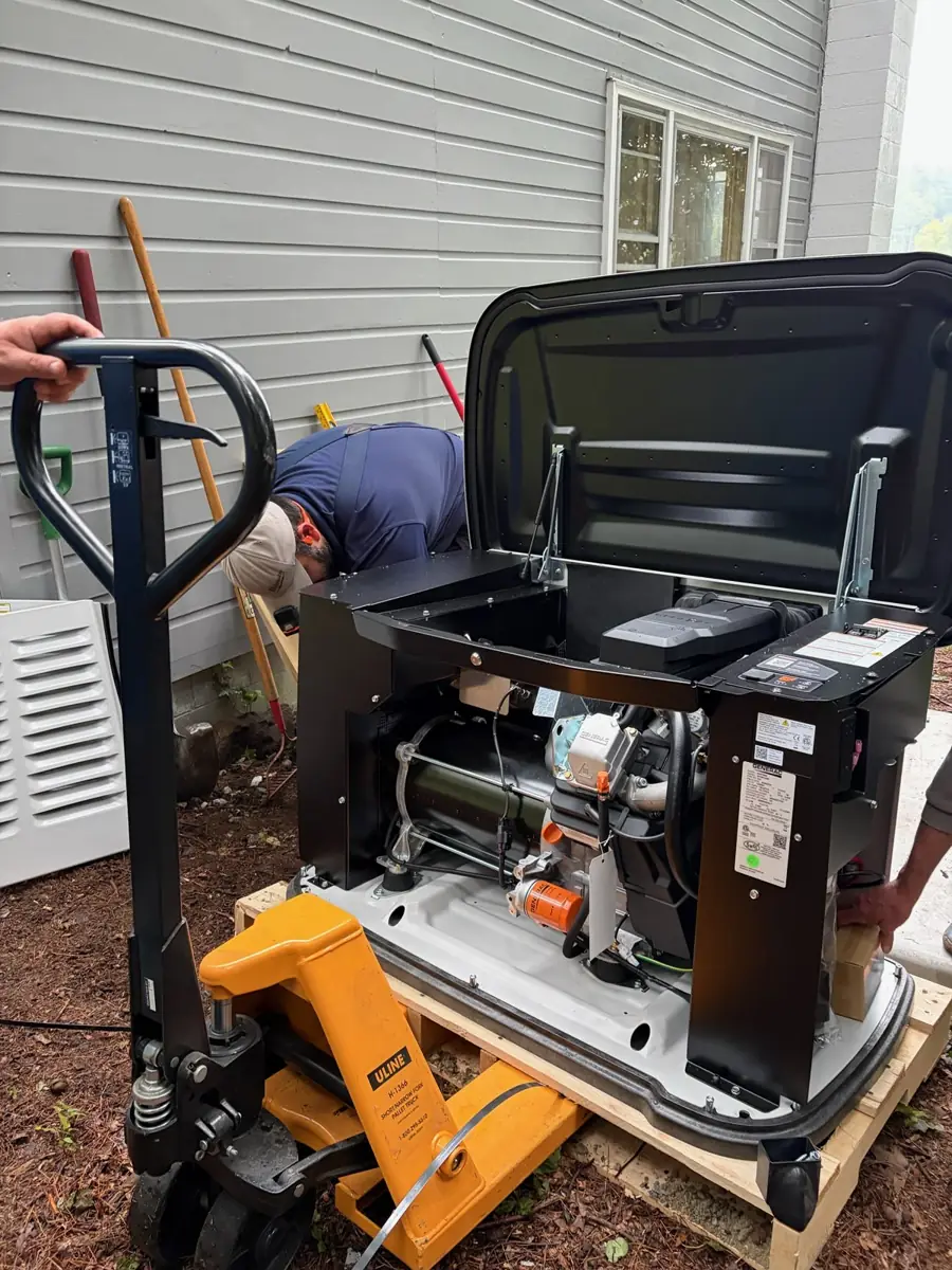 Generac standby generator with its enclosure open during Sylvester Electric installation work