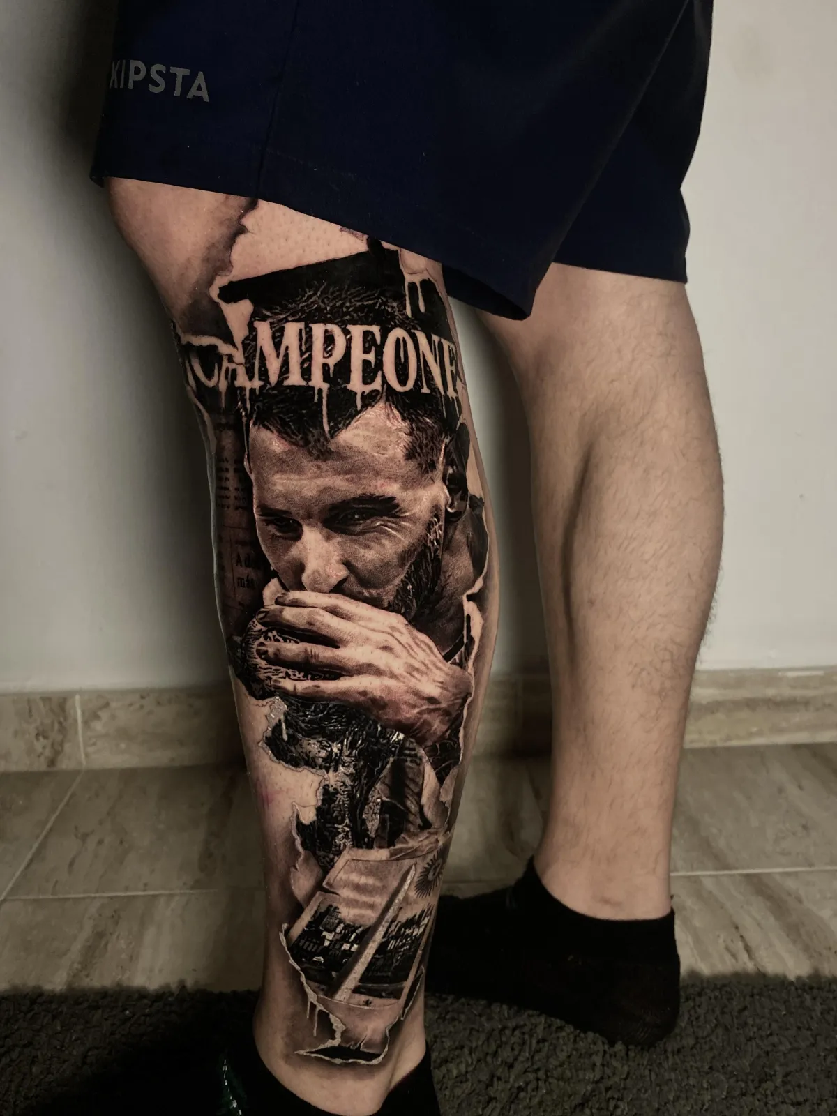 person in blue denim shorts and white nike sneakers standing on gray concrete floor