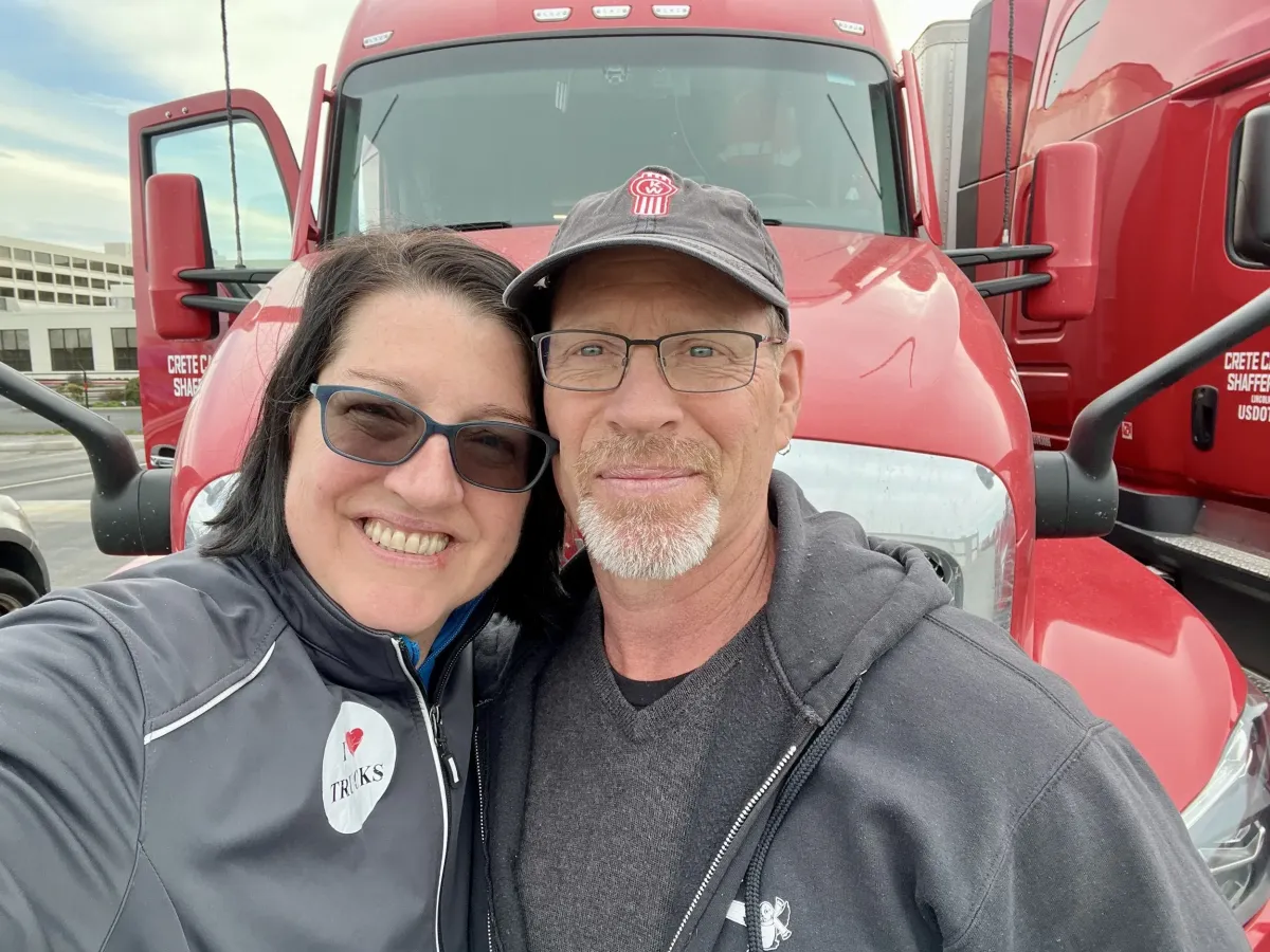 Kevin and Tanja in front of their truck