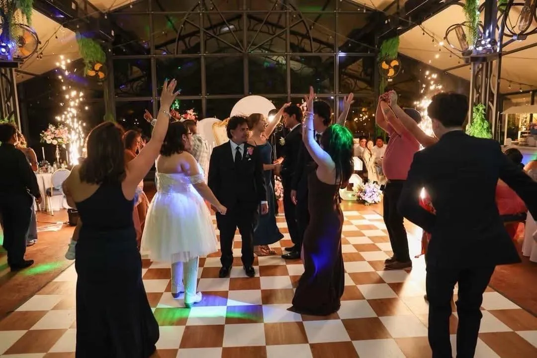 a group of people dancing outside