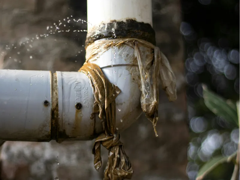 Blocked drain caused by debris and buildup in pipe