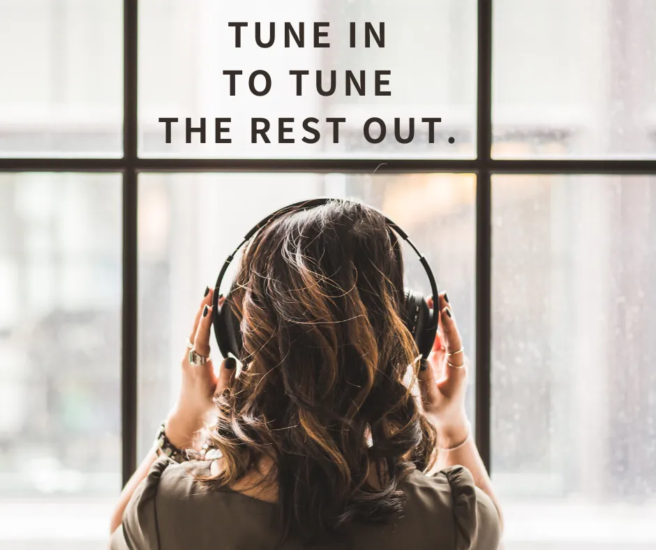 Wearing headphones with soothing music playing for self-care.