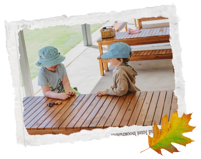 Children sitting together on bench