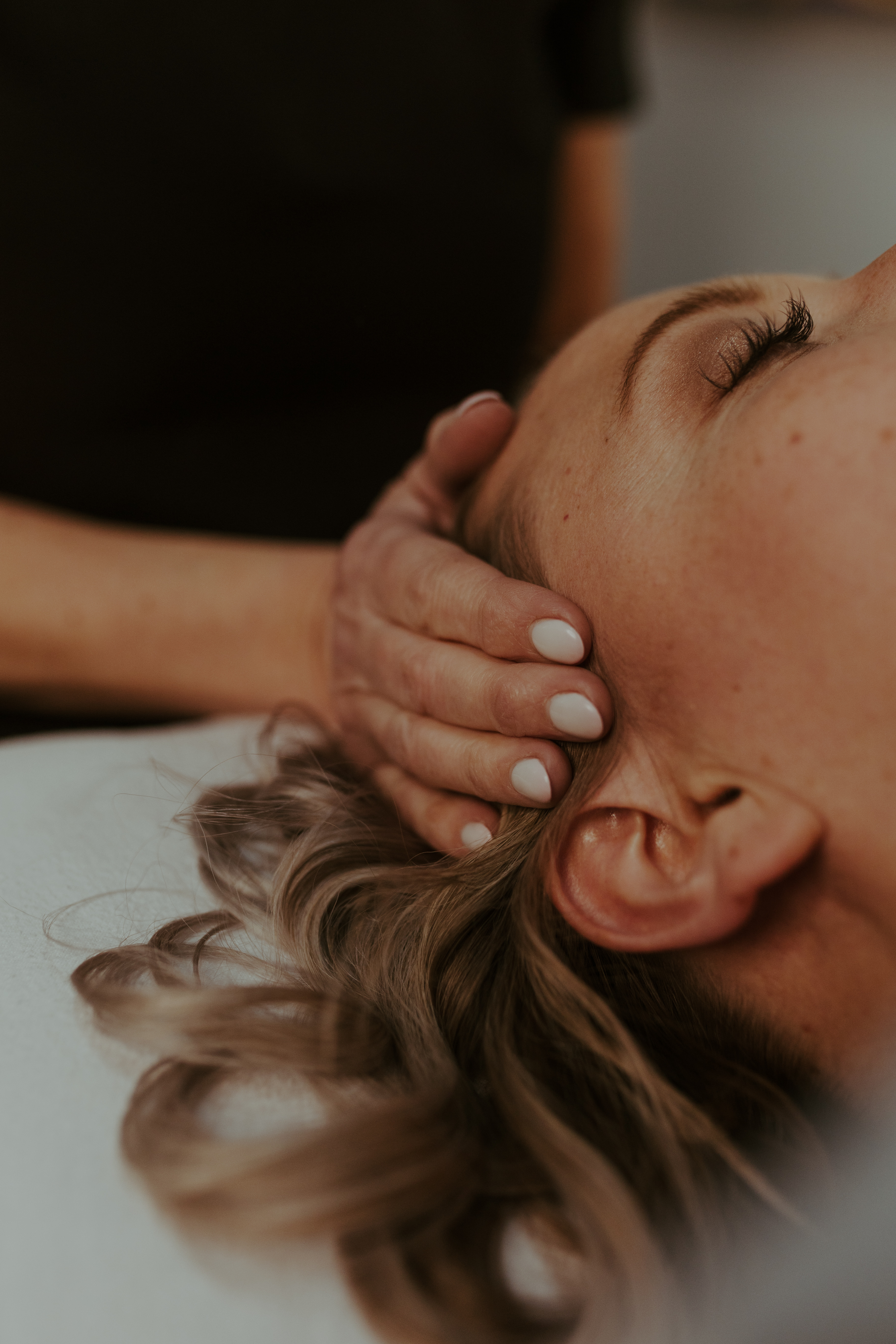 Abstract cool-toned artistic illustration of light and shadow suggesting calm beauty and wellness.