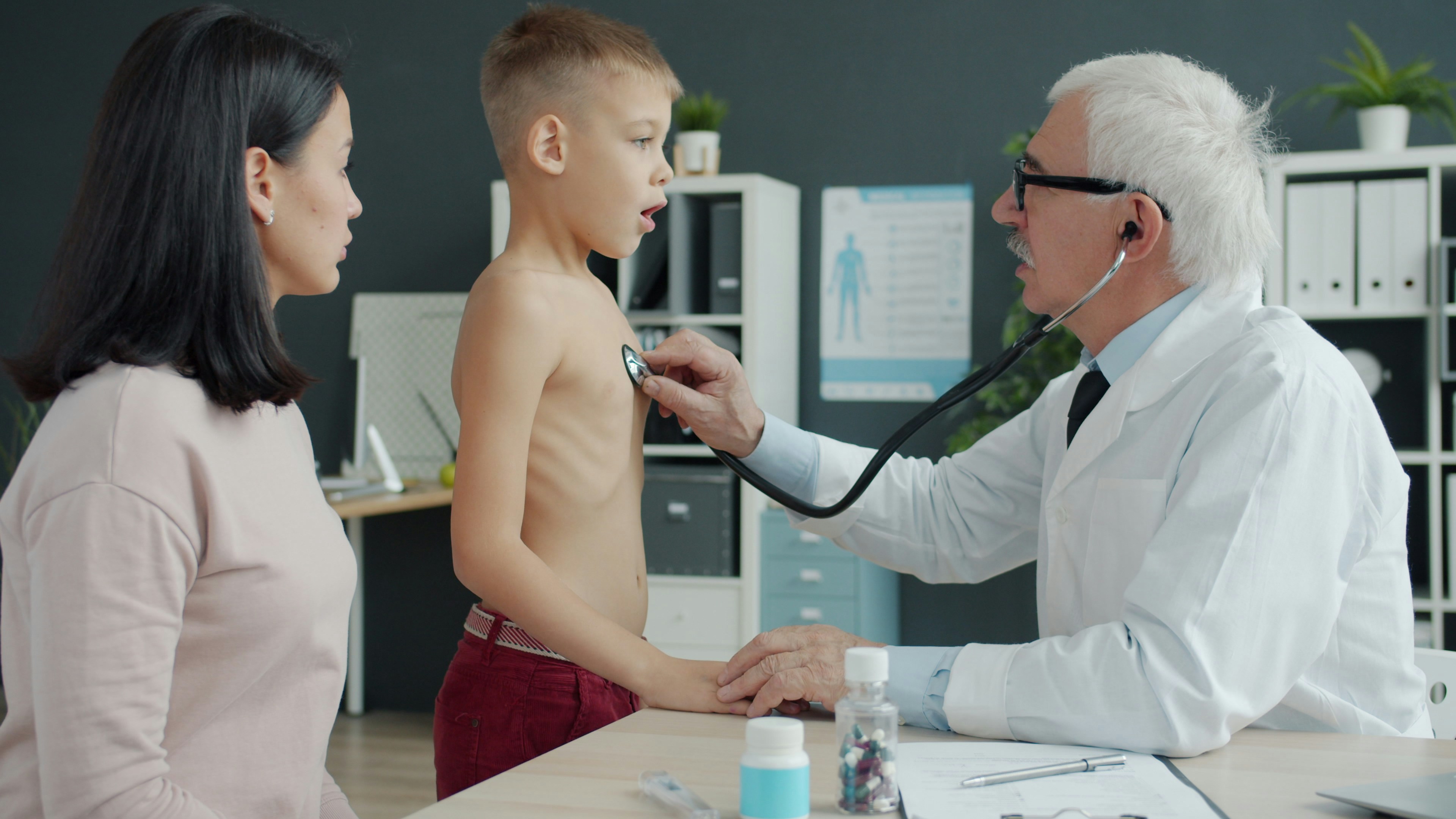Doctor performing a health checkup on a patient