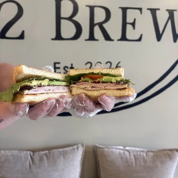 Sandwich and smoothie combo served at 82 Brew café
