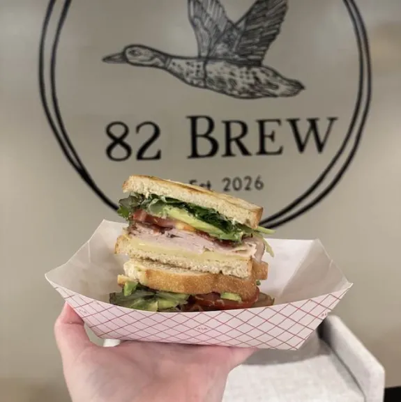 Fresh pastry and iced drink served at 82 Brew café