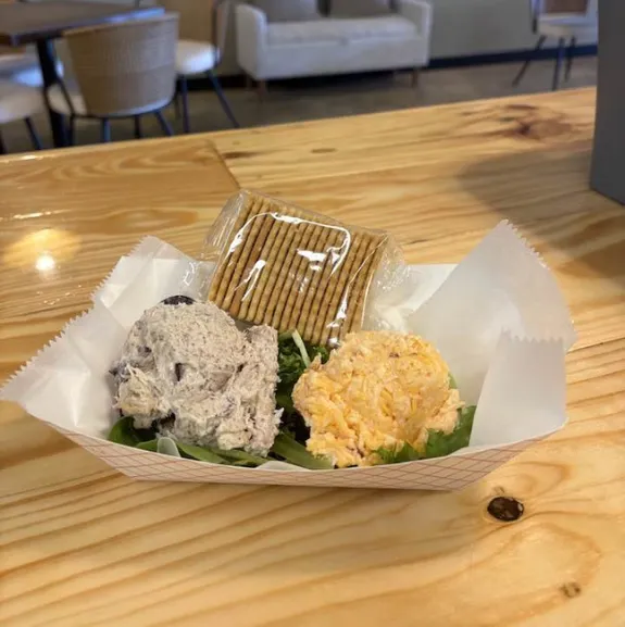 Breakfast sandwich served on toasted bread at 82 Brew