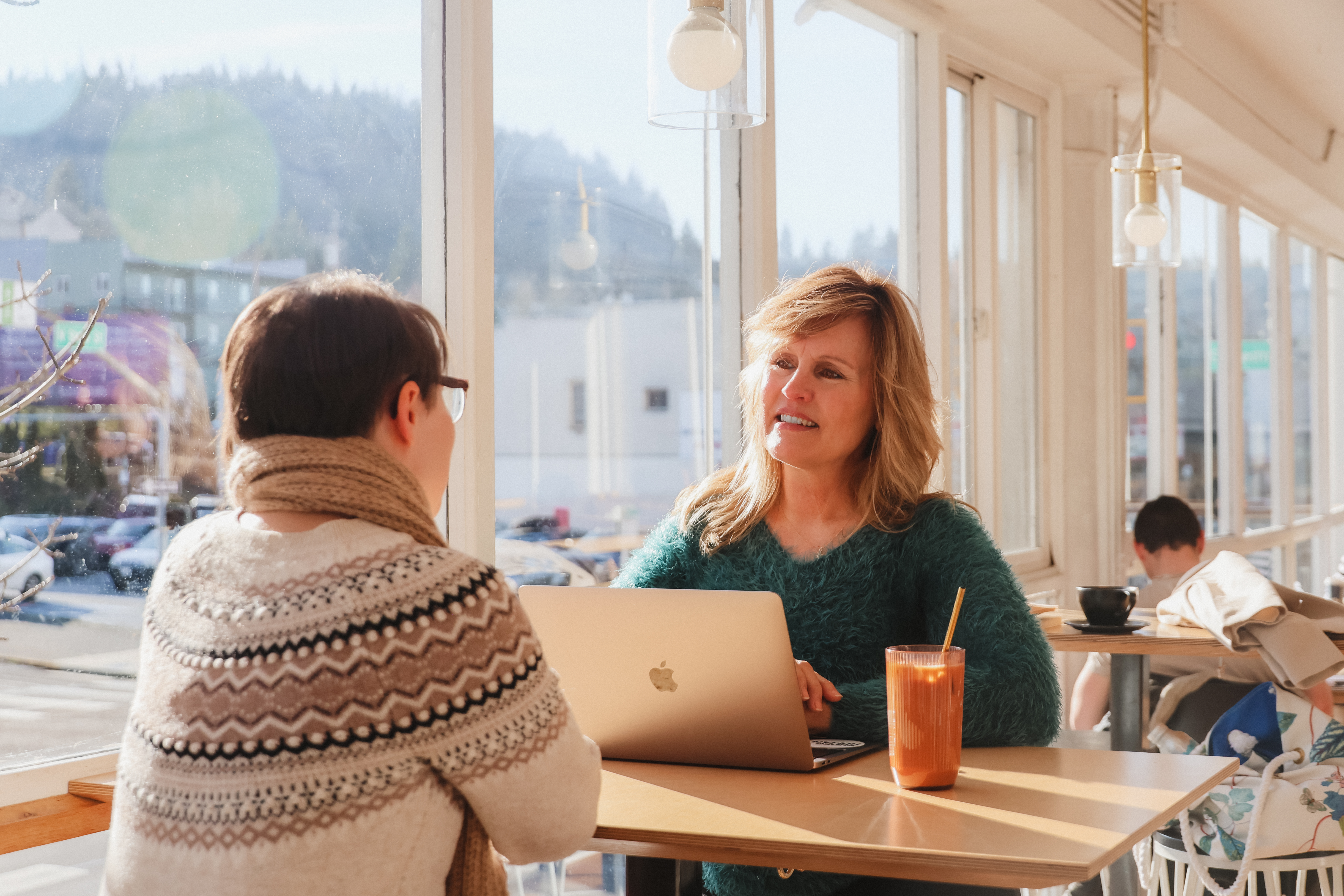 A women and men discussing work