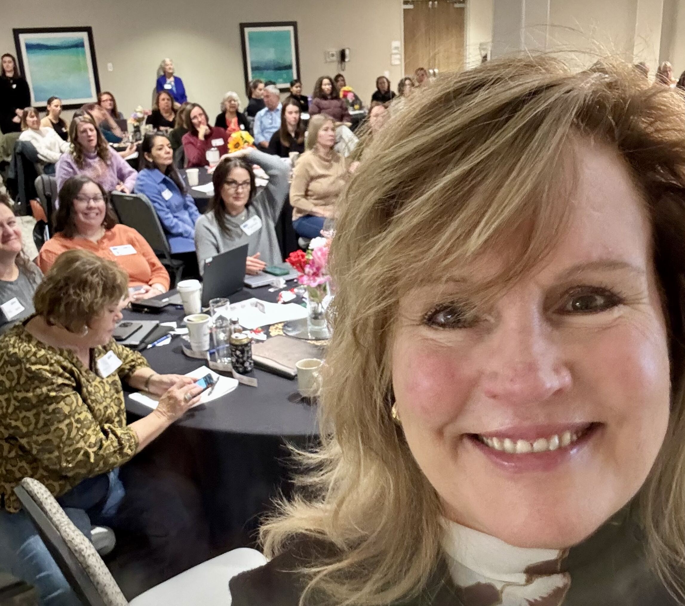 Professional team training workshop participant applying neuroscience-based communication techniques in corporate learning environment