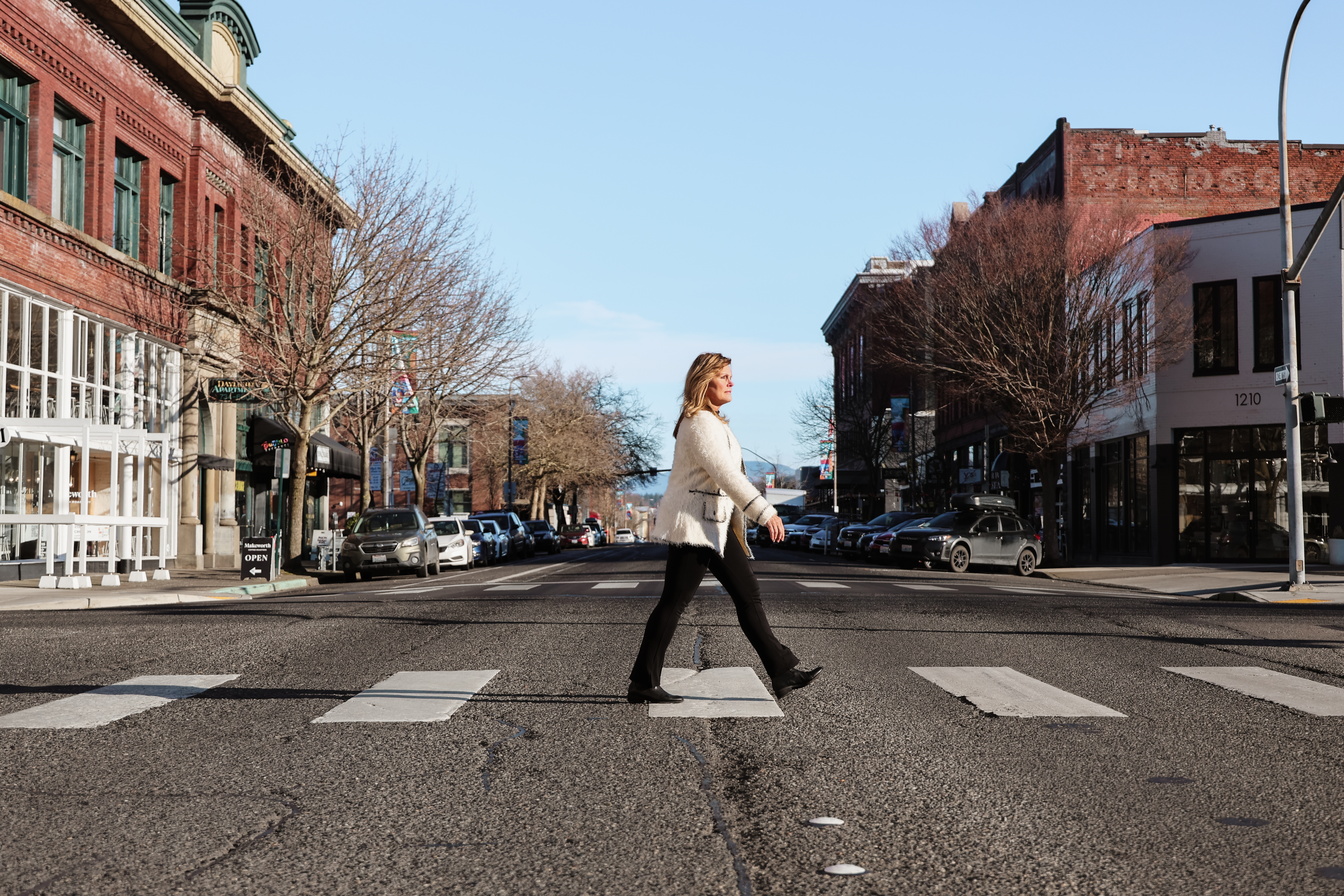 Barbara Jenks walking through a city street