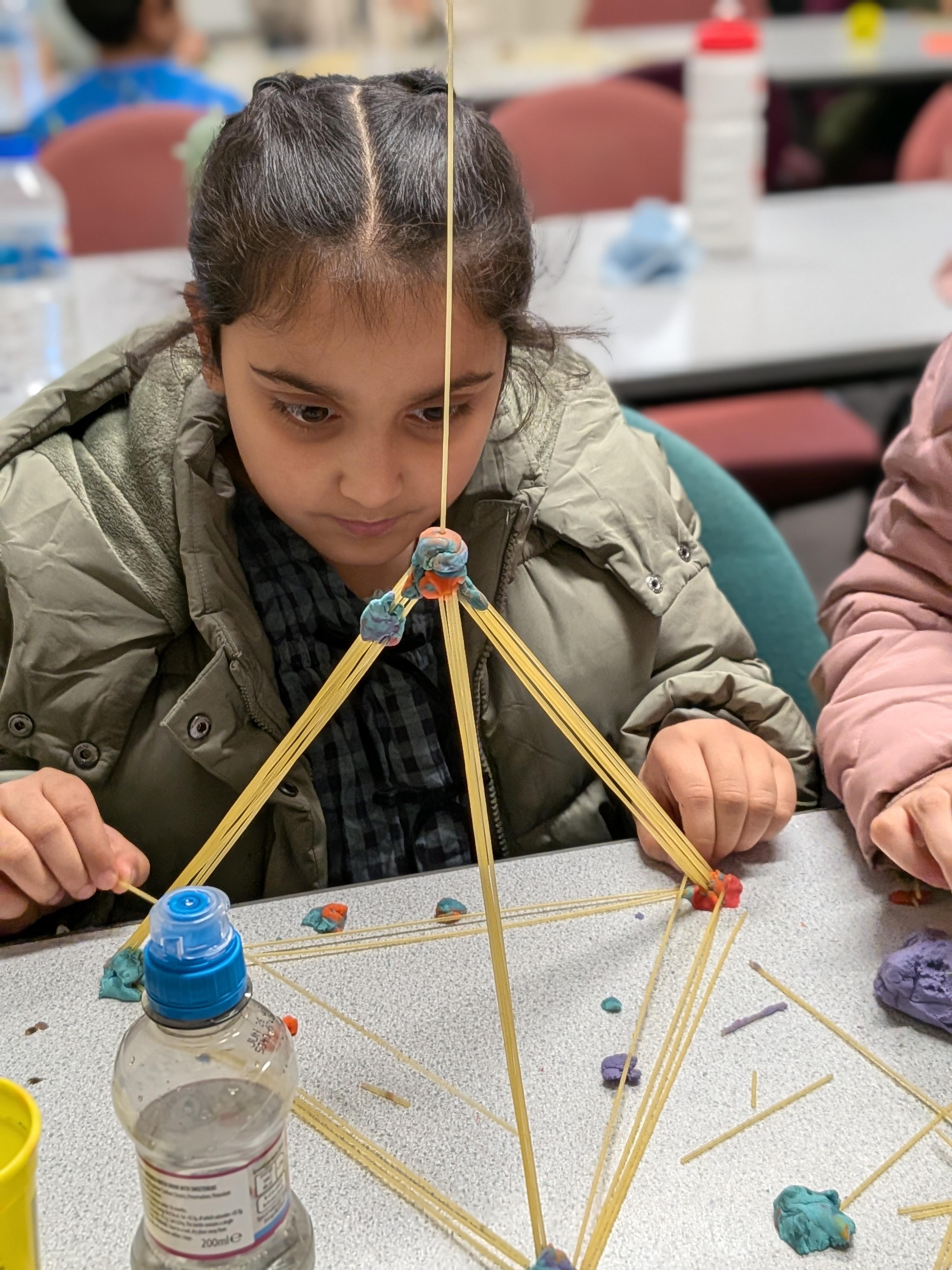 Chid enjoying stem learning legend care.