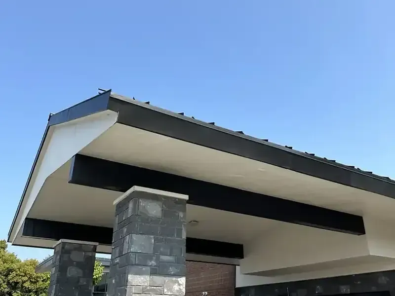 Commercial exterior: Stone pillar building, painted by Turtle Painting