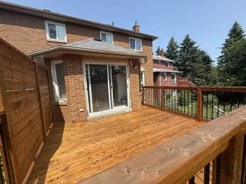 Cedar deck: Privacy wall and deck, painted by Turtle Painting