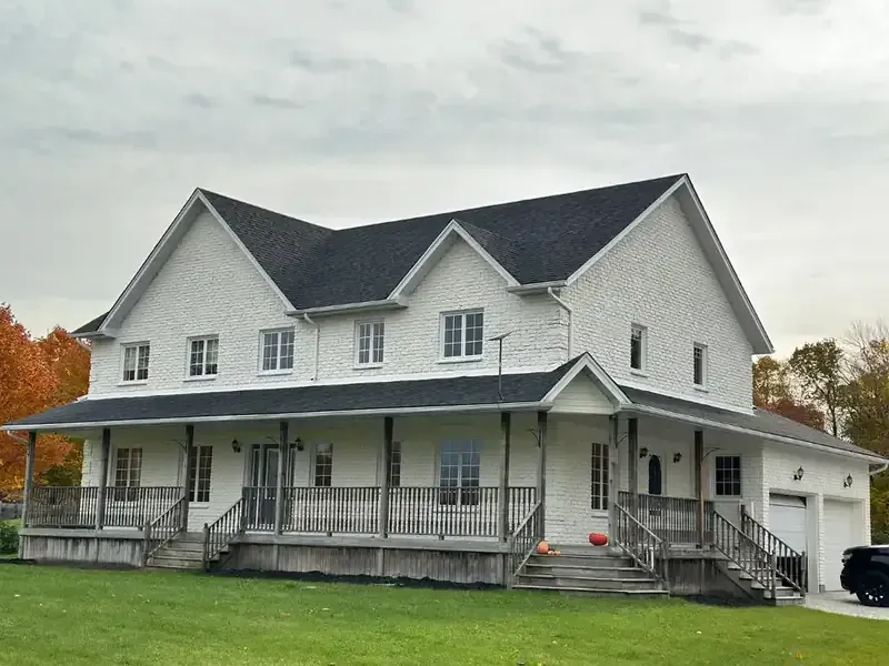 Farmhouse: Wraparound porch repaint, painted by Turtle Painting